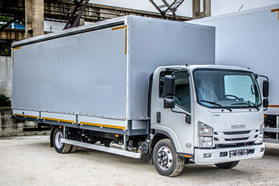 Бортовой автомобиль на шасси ISUZU NQR90LK ELF 9.5